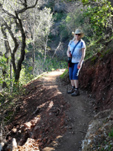 Carolyn on a steep, narrow section of the trail