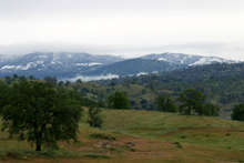 Snow on the lower foothills