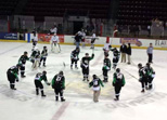 The Monsters salute their fans following the bronze medal victory