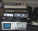 Assorted equipment, with a Commodore up on top