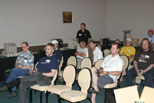 The group watching a DVD provided by Commodore engineers Dave Haynie, Bil Herd, and Bob Russell