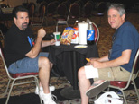 Jim Drew and Greg Alekel sneak a snack