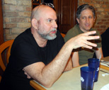 Bil expounds while Greg listens