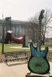 A giant stamp and a giant guitar!