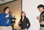 Jeri Ellsworth, George Sanger (center and right) receive the Wild award