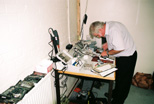 Dave, the technician, toils away on his repairs