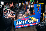 Larry tries his hand at Hotshot Basketball
