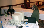 "Krue" (right) discusses demo-making