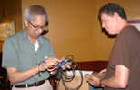 Robert and Roger ponder the coolness of an unknown thing with lots of wires