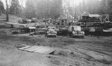 Mill, sawdust pile in background