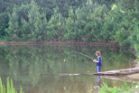 Mikie catches a fish in Alabama