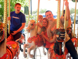 On the Merry-Go-Round with Russell, Grandma Teri, Uncle Mikie, and Great Aunt Jennifer