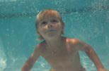 Johnny Upshaw (about 1985) under water at Jan Thomas Swim School, Clovis CA